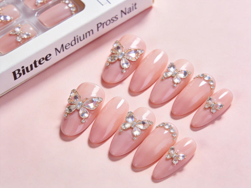 Get Stunning Medium Almond Pink Press On Nails with Butterfly Rhinestones by Biutee | Effortless Glamour