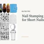 BIUTEE 15-piece nail stamping kit beside short nails with delicate stamped motifs